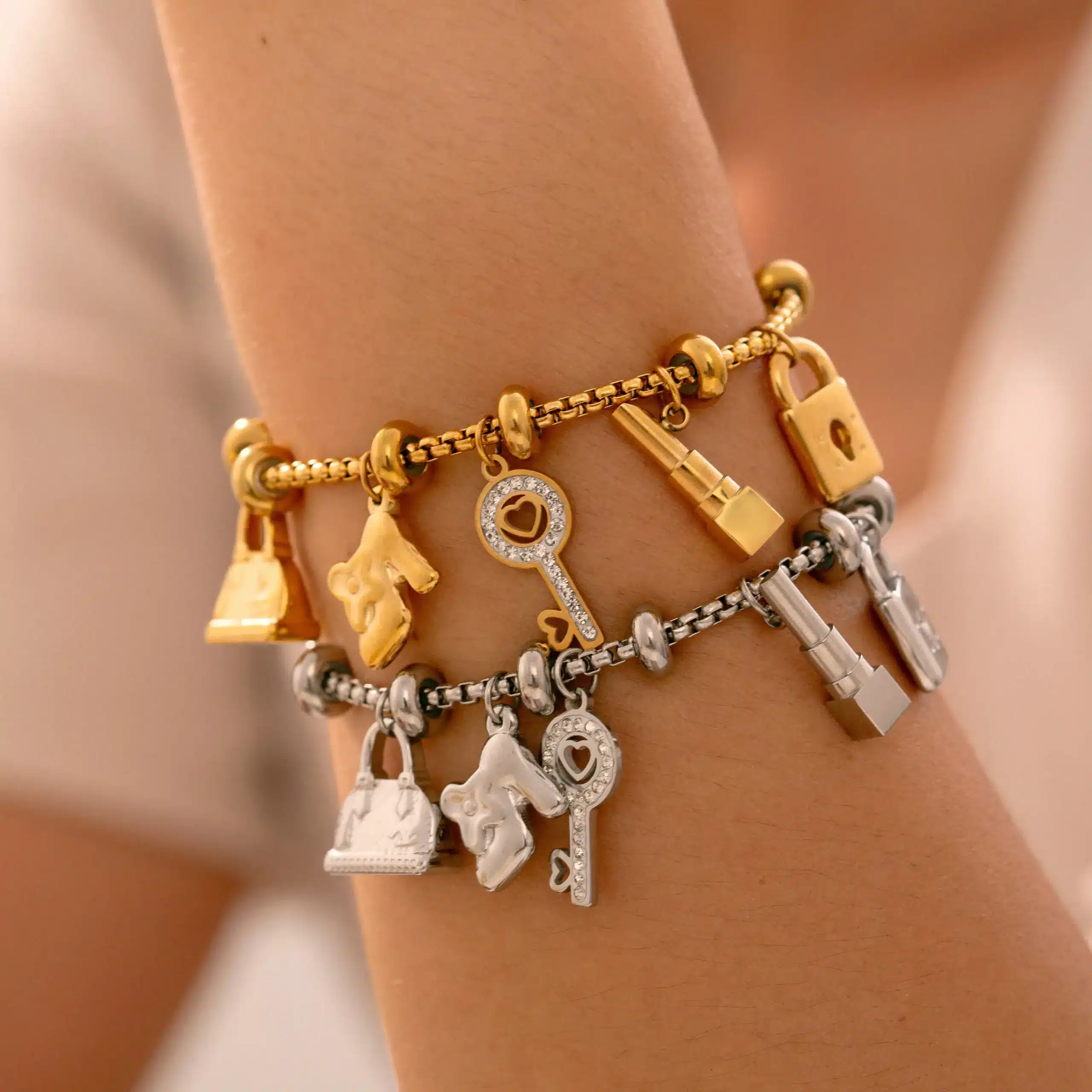 kf-S5dd94d3d79764077a17d0536e2987a54r Stainless Steel Charm Bracelet For Women - Image 1